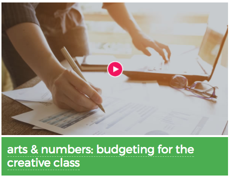 Screenshot of the Arts & Numbers: Budgeting for the Creative Class video with a person writing on paper and working on a laptop.