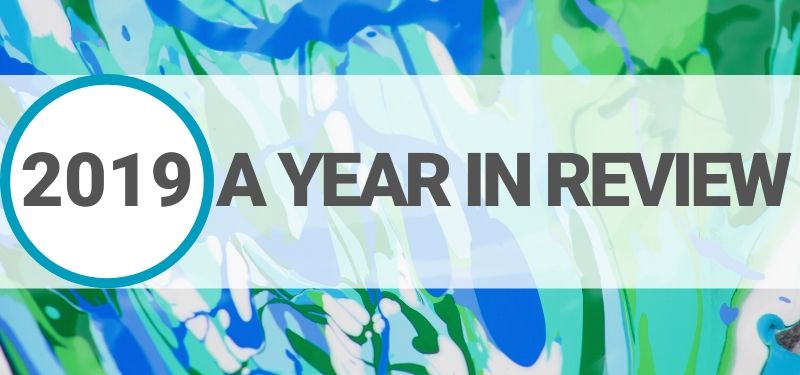 Text over blue and green background that says 2019 a year in review