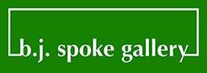 Spoke Gallery logo; text in white on a green background