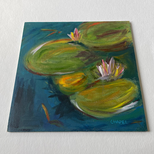 photographing artwork painting of lily pads taken at an angle so the edges of the painting appear as a trapezoid
