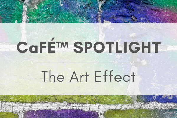 image of a spray-painted brick wall with a white banner over and the text that reads "CaFÉ Spotlight: The Art Effect"
