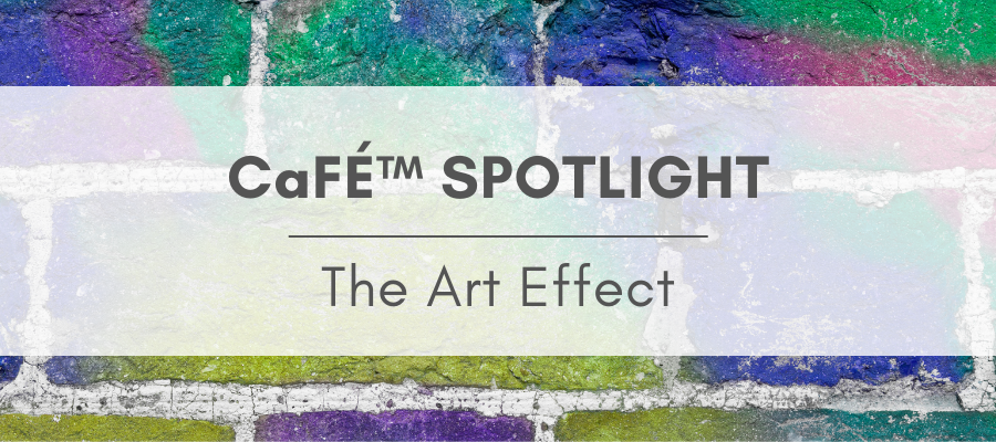 image of a spray-painted brick wall with a white banner over and the text that reads "CaFÉ Spotlight: The Art Effect"